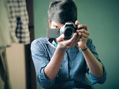 Man with DSLR camera