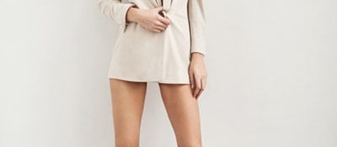 Glamour brunette model with long legs